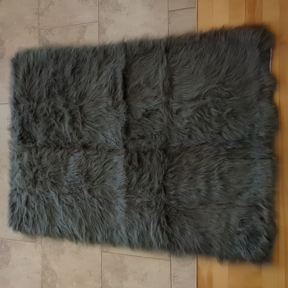 Gray faux fur rug